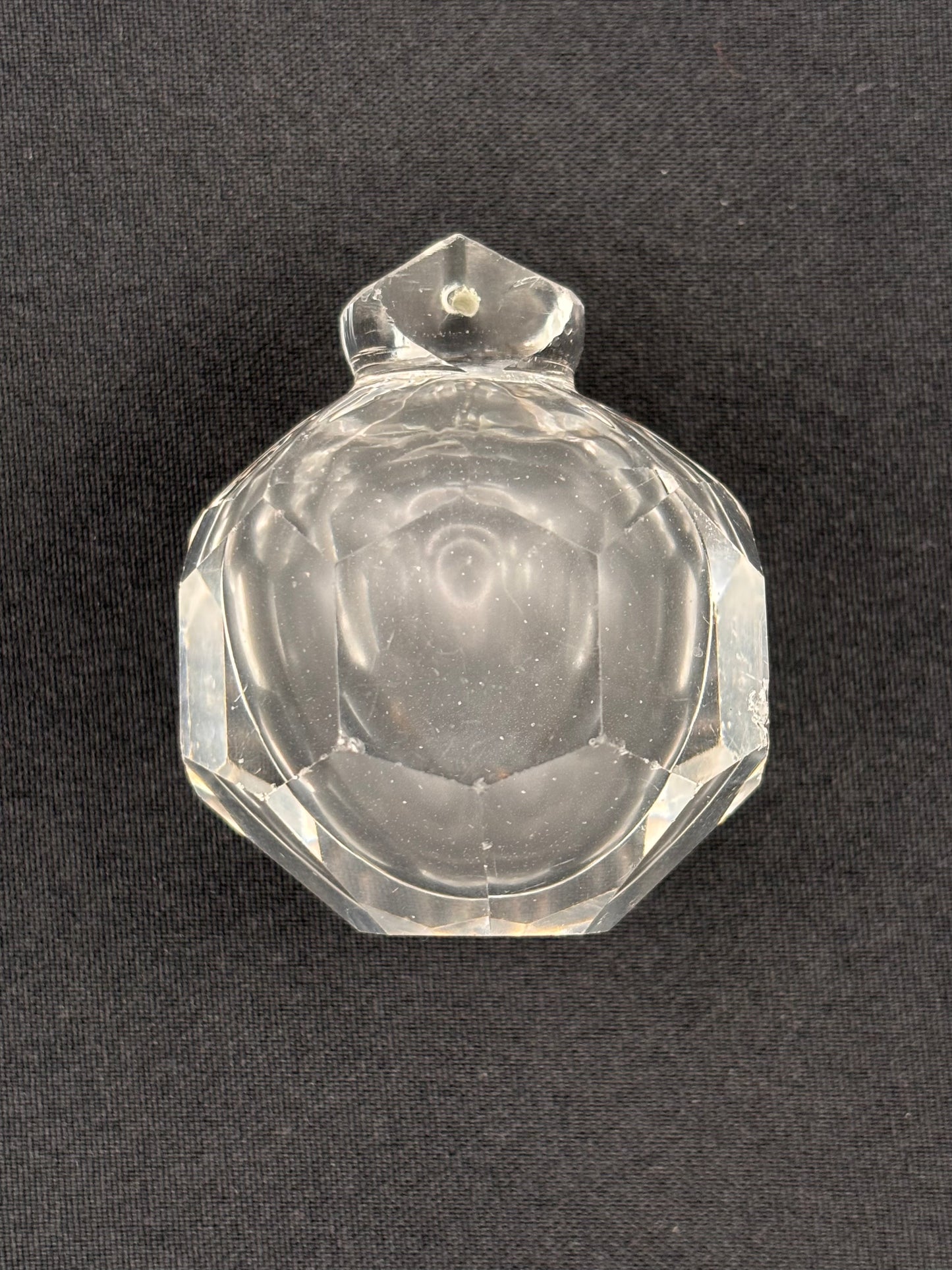 Finial with facets and opaline air bubble.