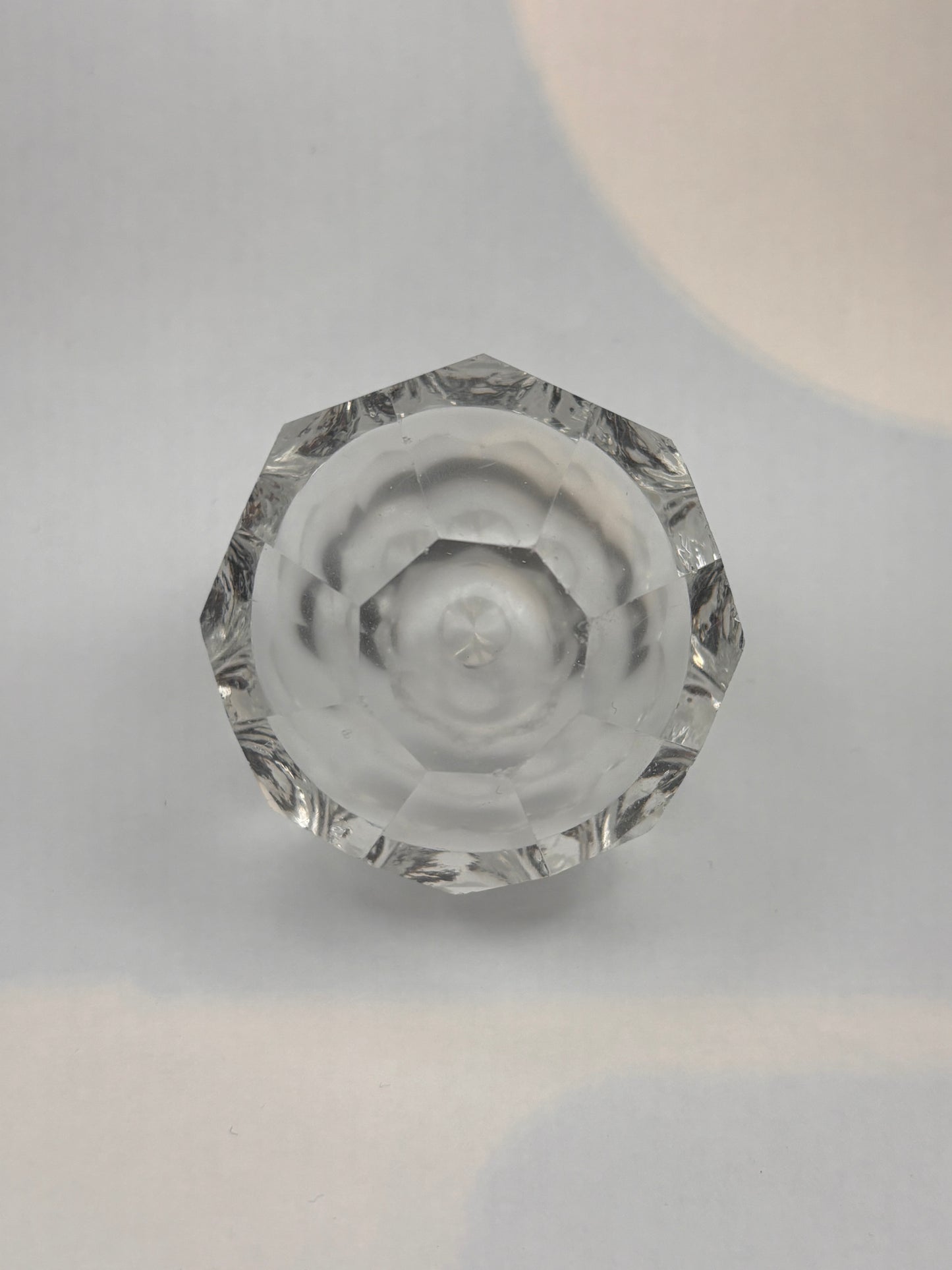Finial with facets and opaline air bubble.