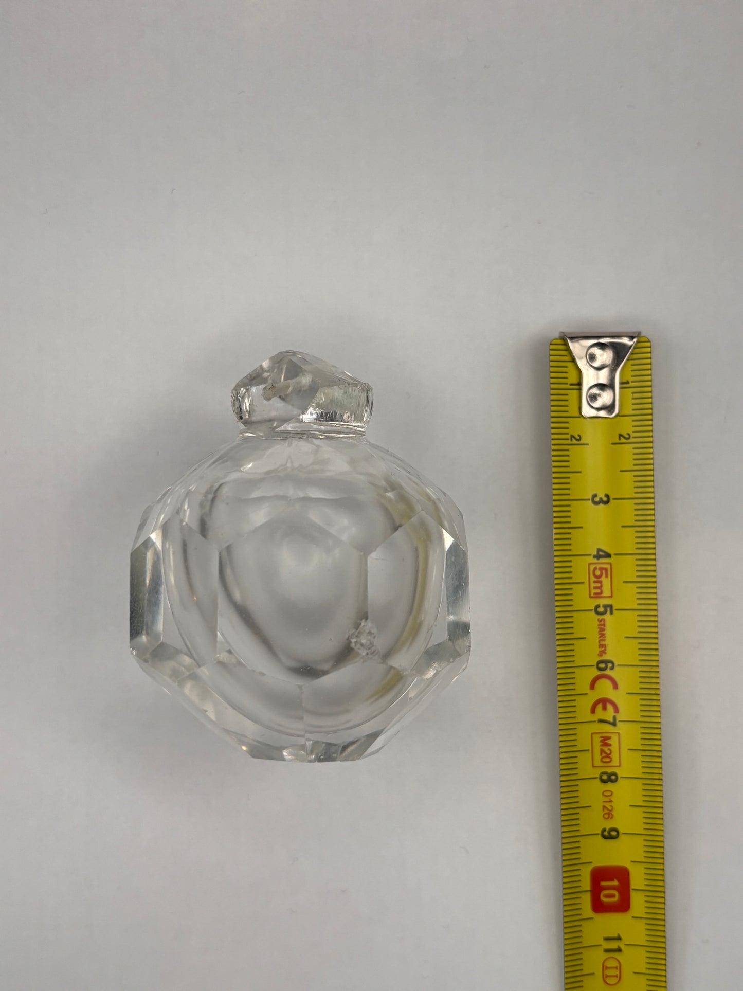 Finial with facets and opaline air bubble.