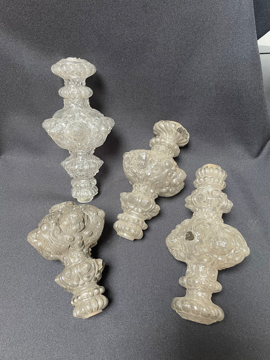 Set of stem elements with putto and scrolls