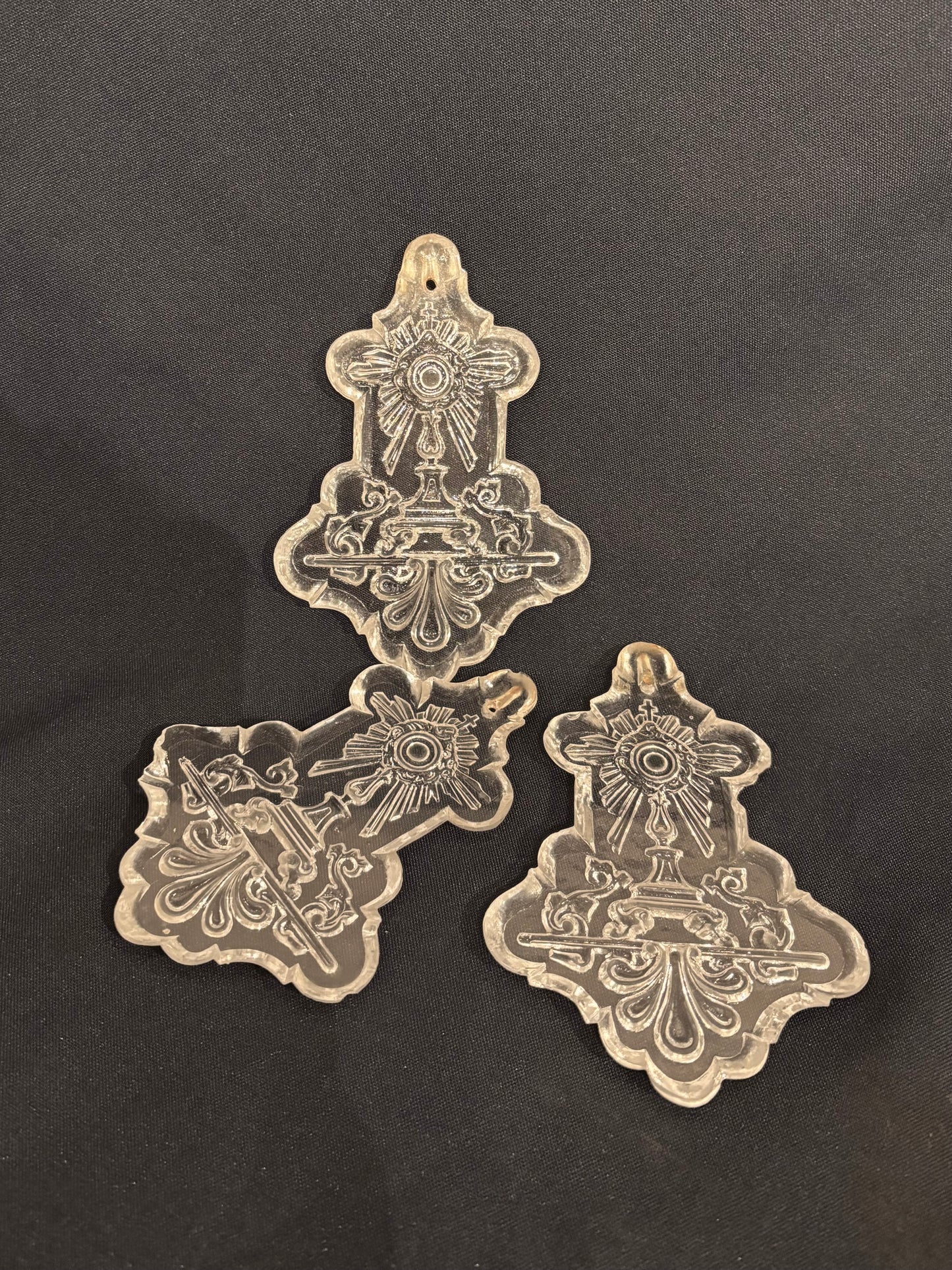 03-0008 Set of three plaquettes with monstrance