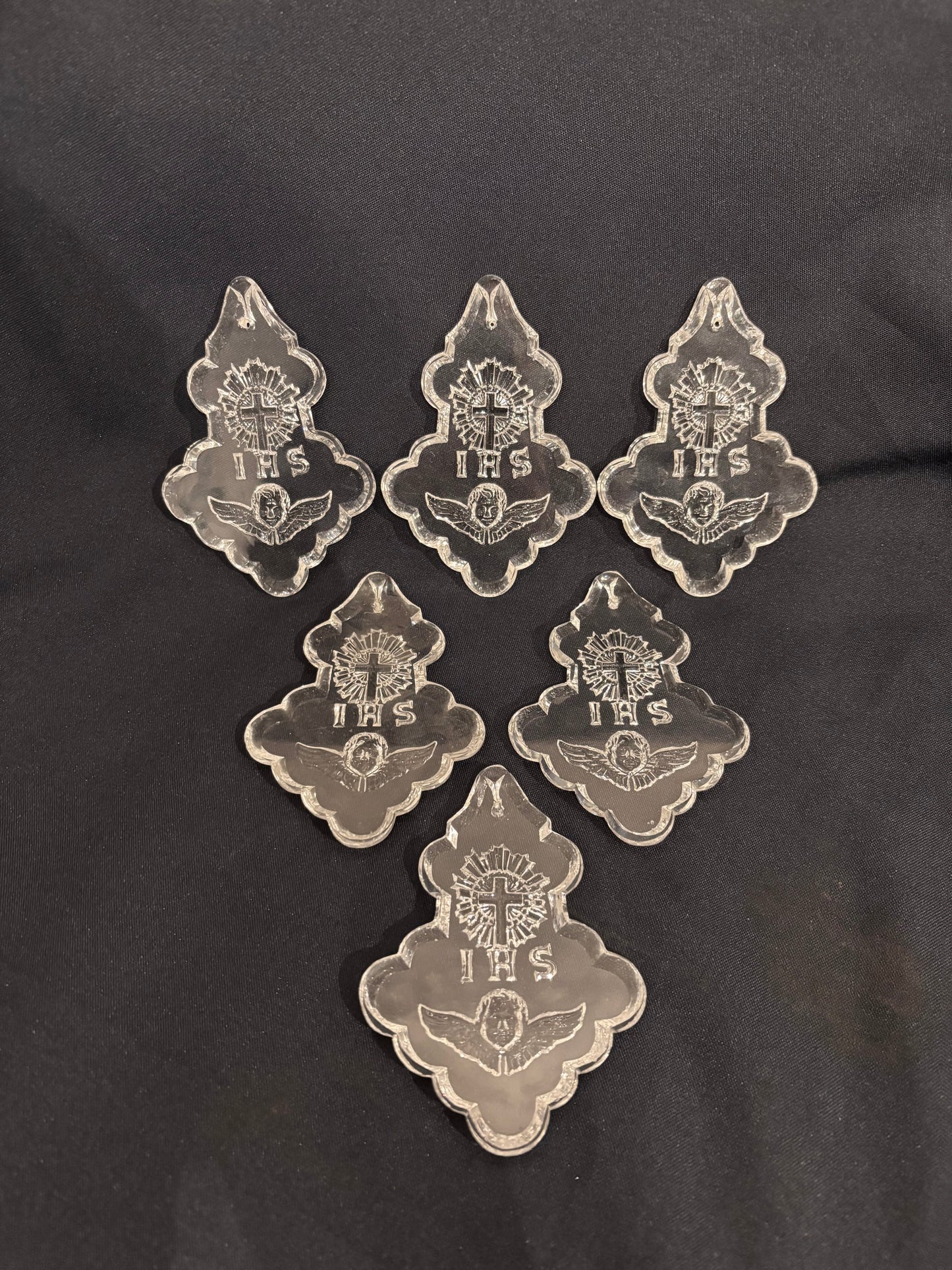 03-0007 Set of six plaquettes with cherub, IHS and cross